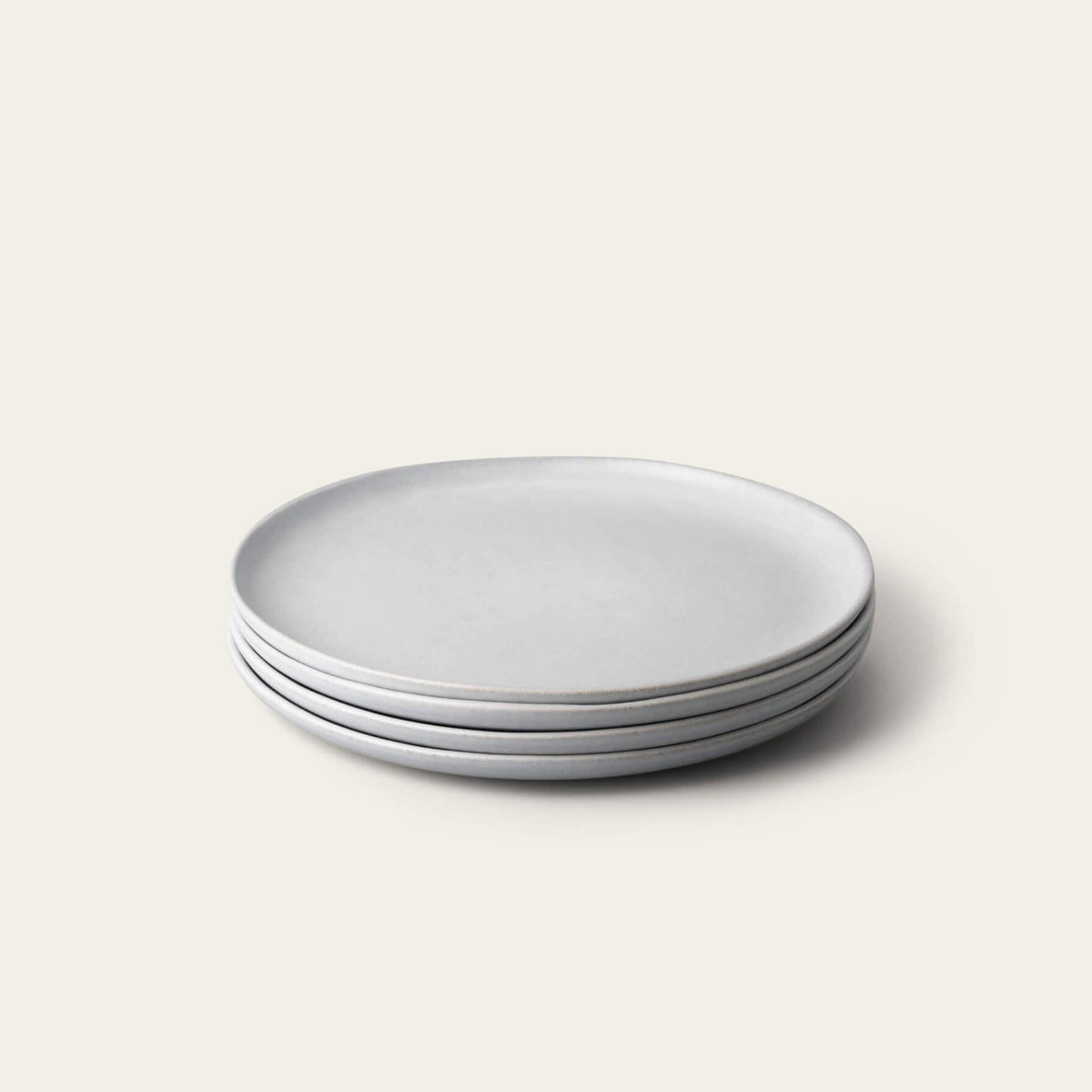 Salad plates dinnerware by Fable Home, shown in a stoneblue finish. – #stoneblue